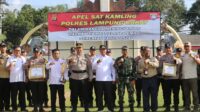 Pj Lampung Barat Menghadiri Apel Satuan Keamanan Di area Polres Lingkungan Satkamling