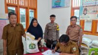 Polsek Pesisir Tengah Monitoring Penyaluran Bantuan Cadangan Pangan Pemerintah